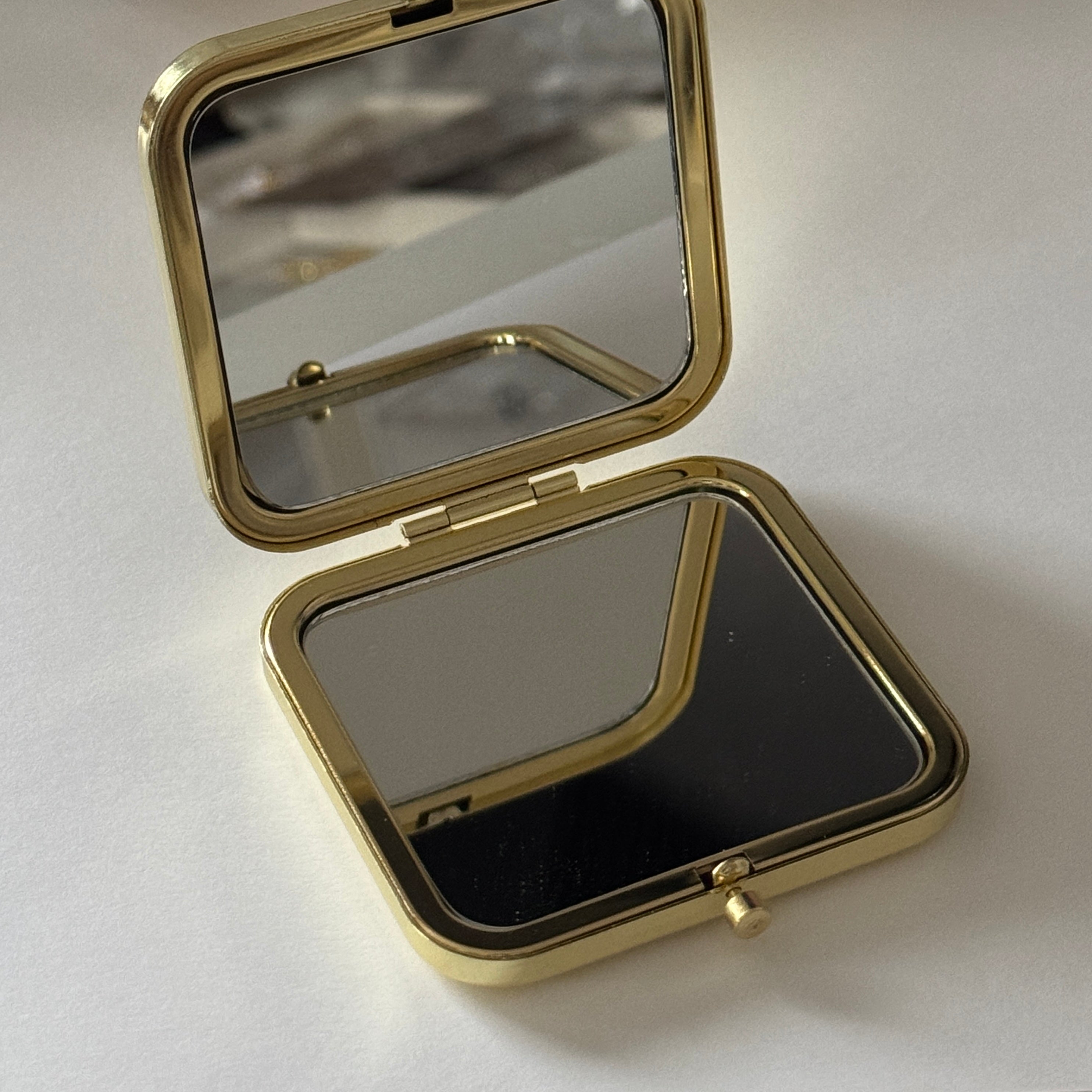 London gold compact mirror