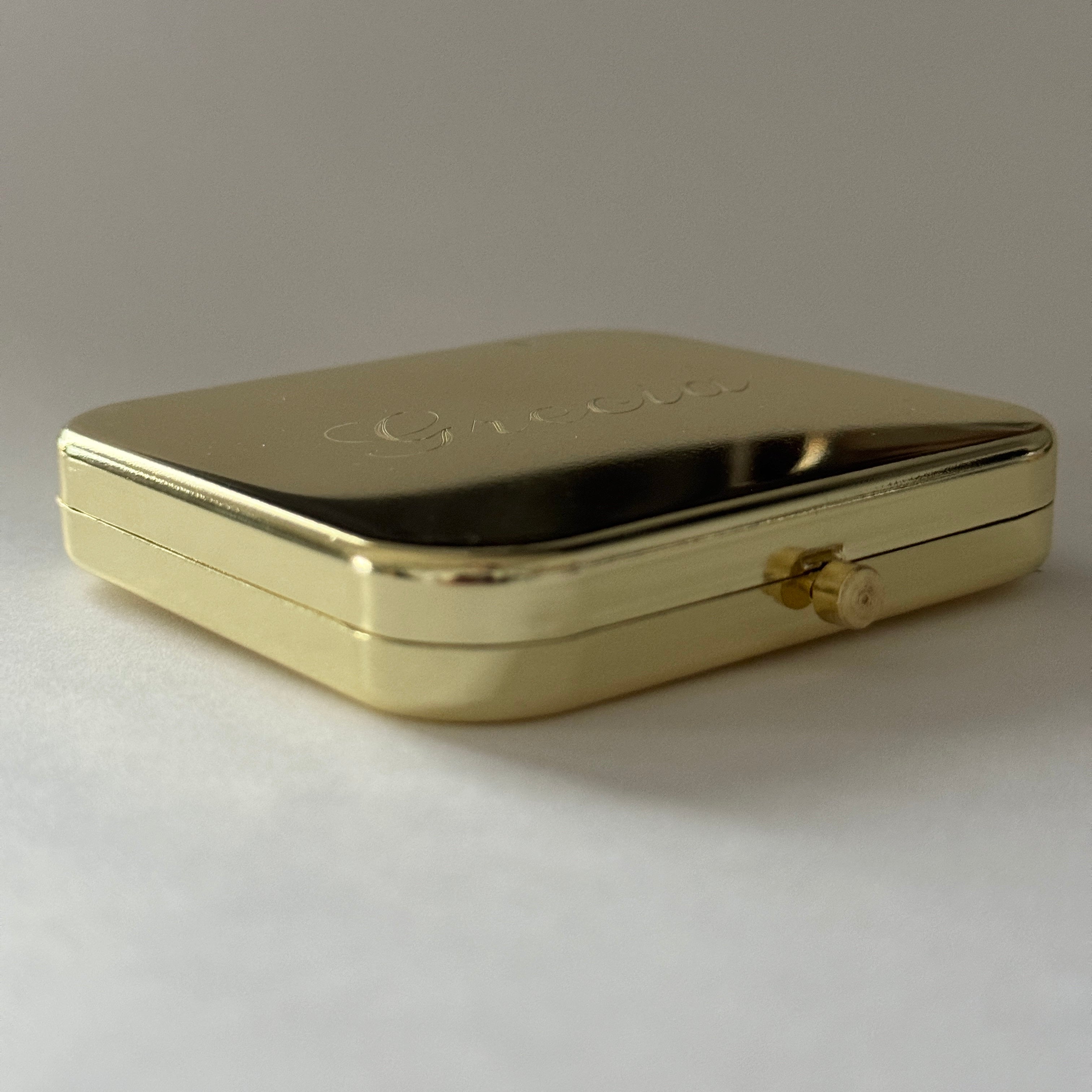 London gold compact mirror
